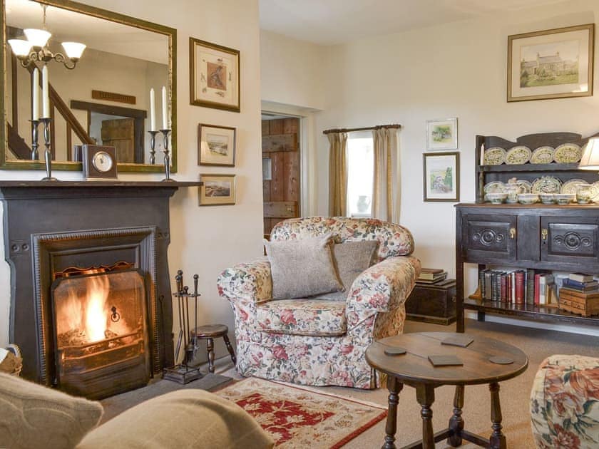Welcoming living room with open fire | Bryn Tirion, Trefor, Anglesey