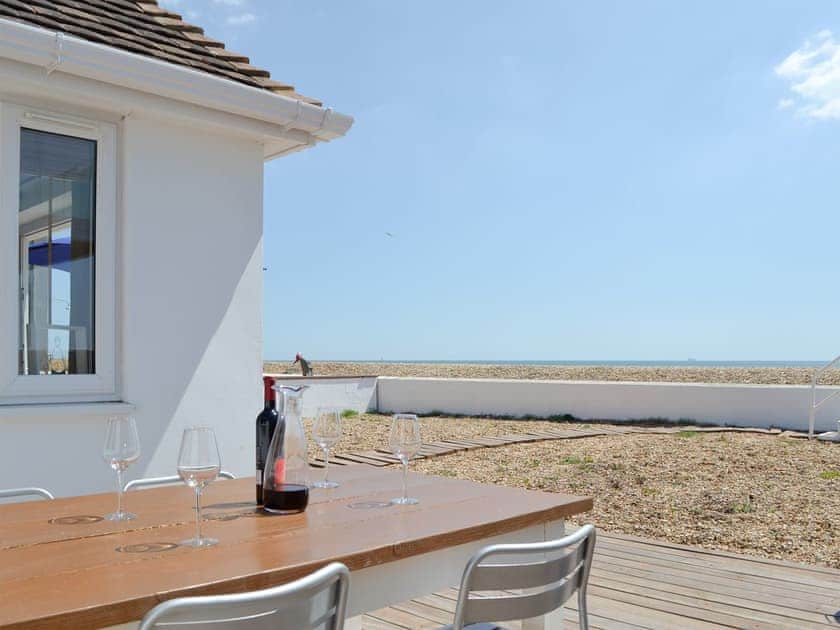 Outdoor eating area on the decked patio | Salty Lodge, Hayling Island
