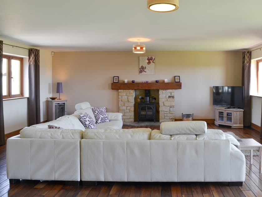 Spacious living room with multi-fuel burner | Applegarth House, Howlish, near Bishop Auckland