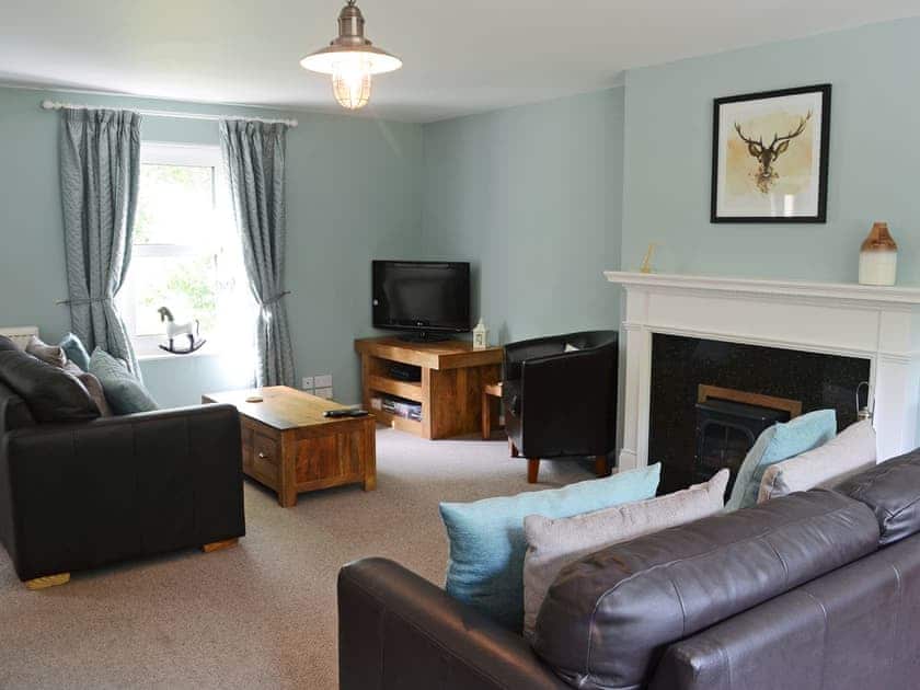 Beautifully presented living area | Garden Cottage, Tain