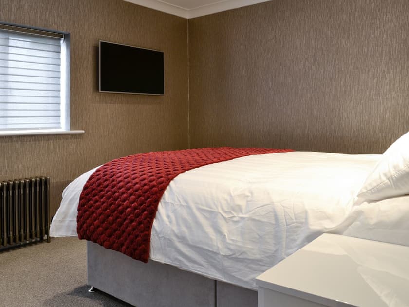 Double bedroom with TV | Fernhill Cottage, Oxenhope, near Haworth