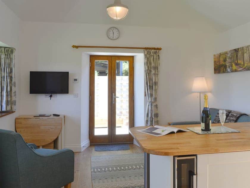 Comfortable open plan living space | The Cart Linhay, Meshaw, near South Molton