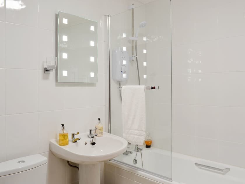 Family bathroom with shower over bath | Bandrake Barn, Oxen Park, near Ulverston