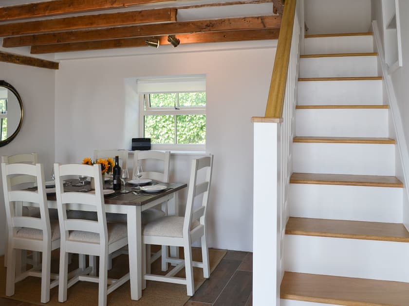 Spacious living area and stairs to first floor | Bryn Awel, Moelfre, near Benllech