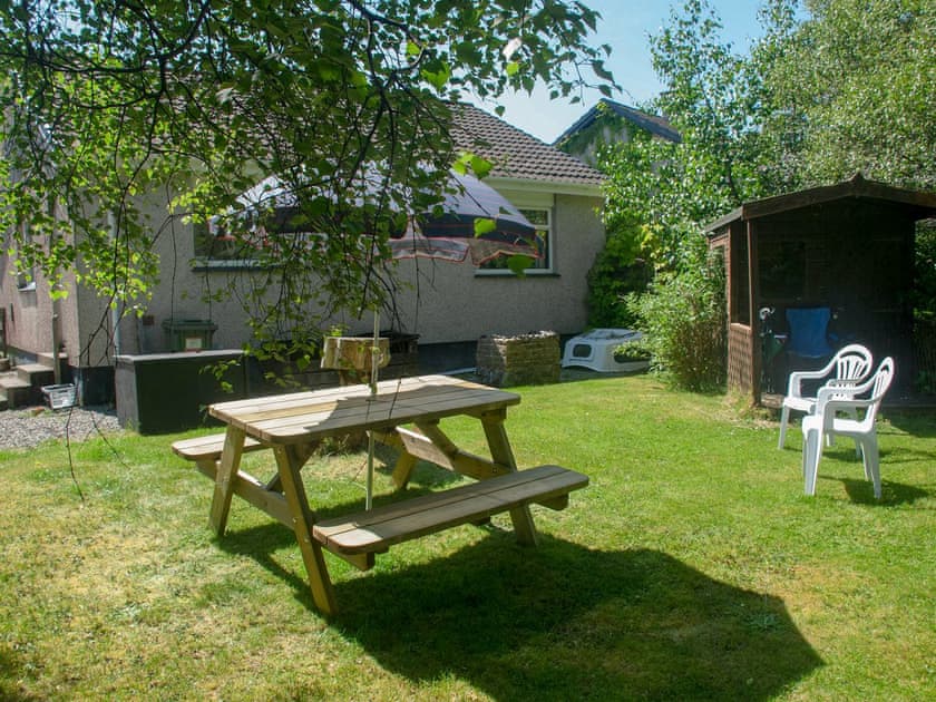 Sitting out area int he garden | Taigh Mhairi, Portree, Isle of Skye