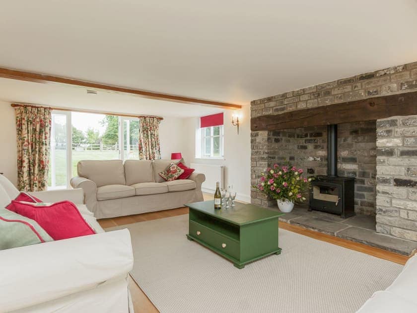 Large living room with a wood burner | Bucks Cottage, Baltonsborough, near Glastonbury