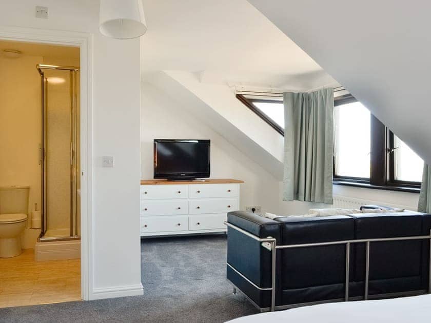 Relaxing master bedroom suite with en-suite shower room | Harbour Gates, Maryport