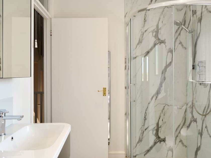 Family bathroom with shower cubicle and bath | Harbour Gates, Maryport