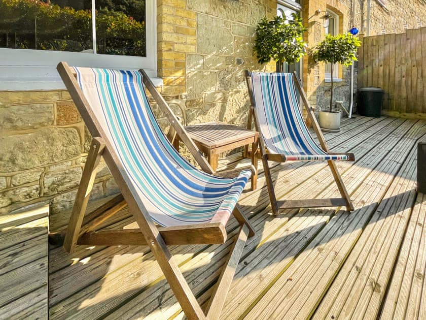 Enclosed decked area with garden furniture | Little Grosvenor, Ventnor