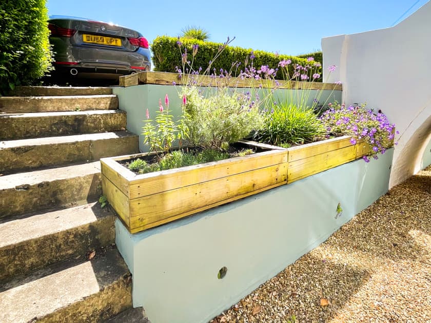 Enclosed decked area with garden furniture | Little Grosvenor, Ventnor