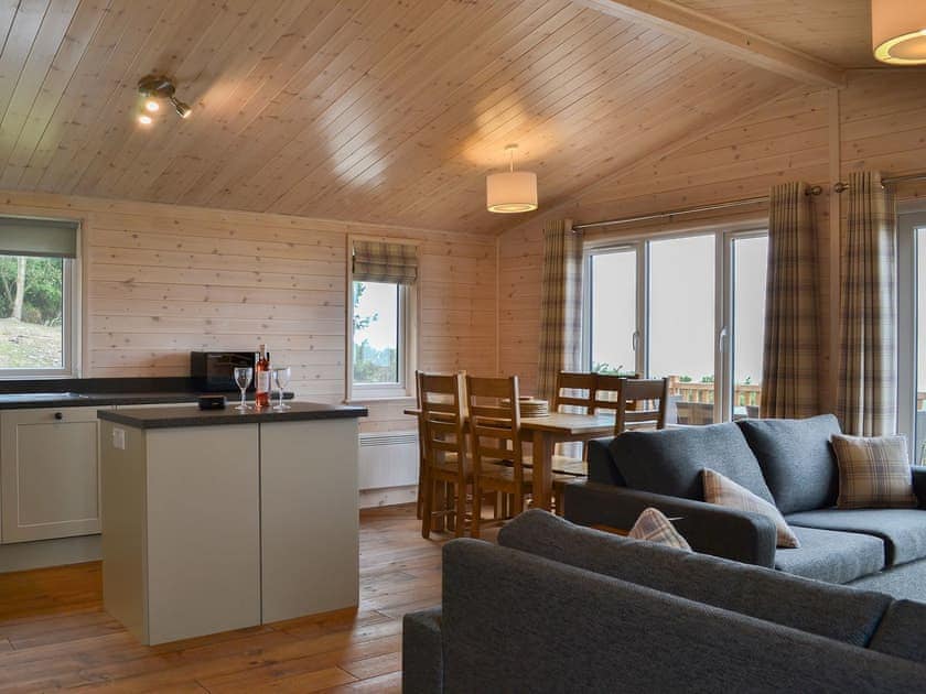 Cosy seating, bright dining area and lovely kitchen | Ben Wyvis - Woodland Lodges, Forres, near Nairn