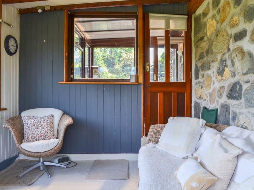 Relax and admire the view from the sun room | Y Bwthyn, Llandygai, near Bangor