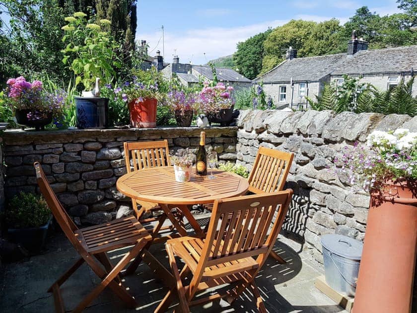 Relaxing sitting-out-area | Poppy Cottage, Hebden, near Grassington