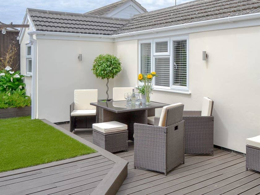 Decked area with sitting out furniture | Broadland Hideaway, Martham, near Great Yarmouth
