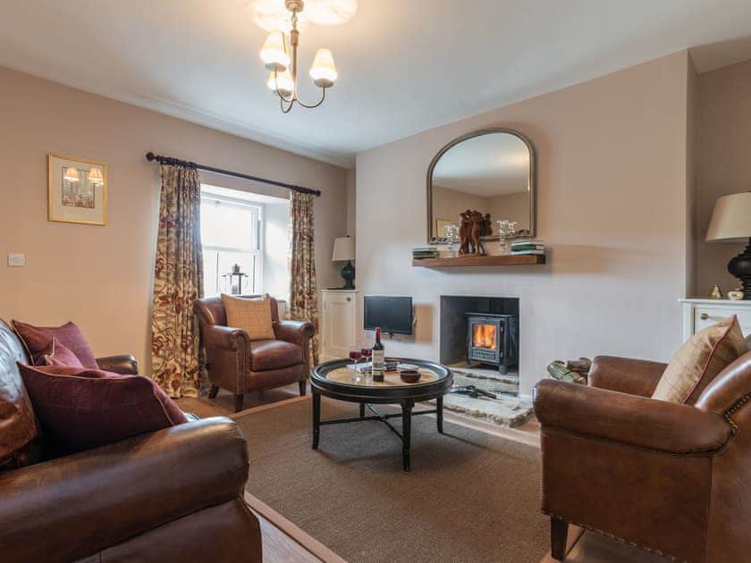 Cosy living room with wood burner | Helwith Cottage, Helwith, near Marske