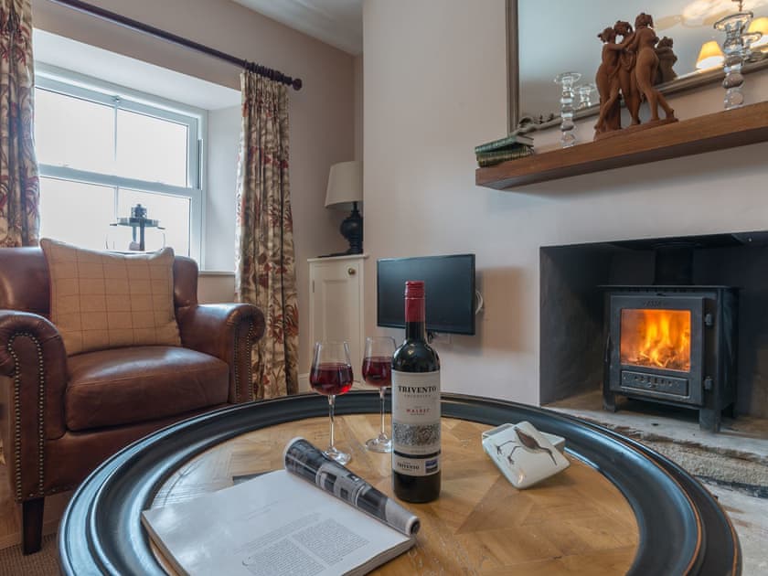 Relaxing living room with wood burner | Helwith Cottage, Helwith, near Marske