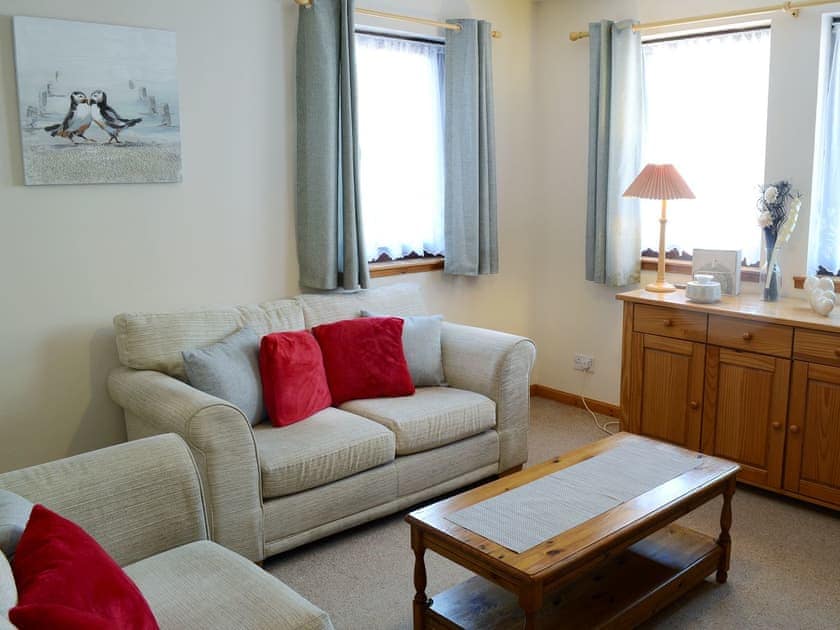 Attractive good-sized living room | Acorn Cottage, Conon Bridge
