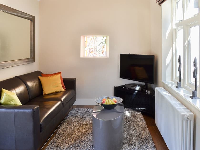 Open plan living area with comfortable sofas | Coach House, Acaster Malbis, near York