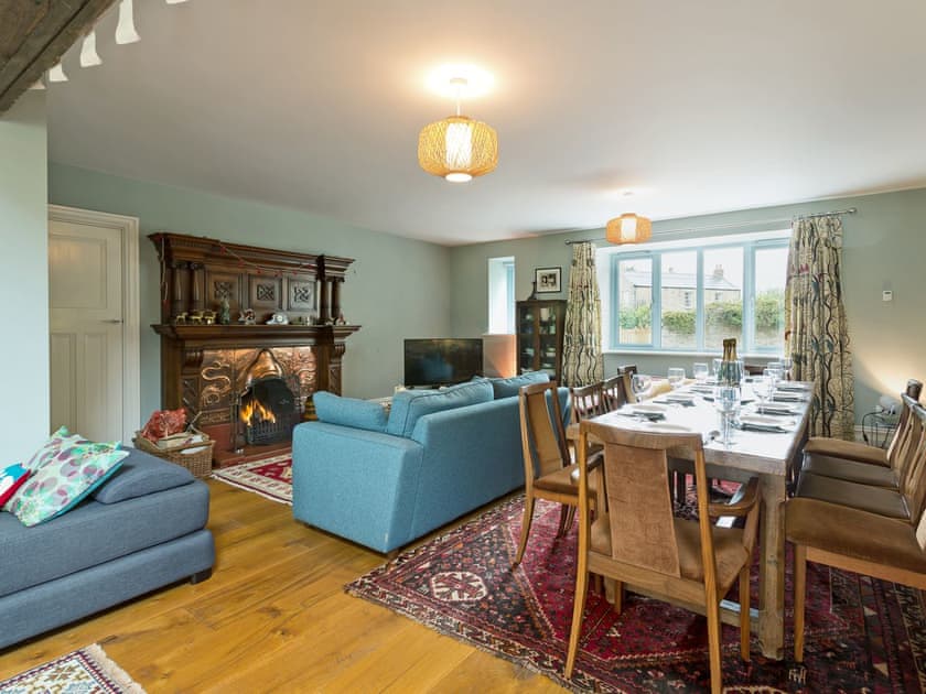 Inviting dining area with open fire | The Coach House, High Urpeth, near Chester-le-Street