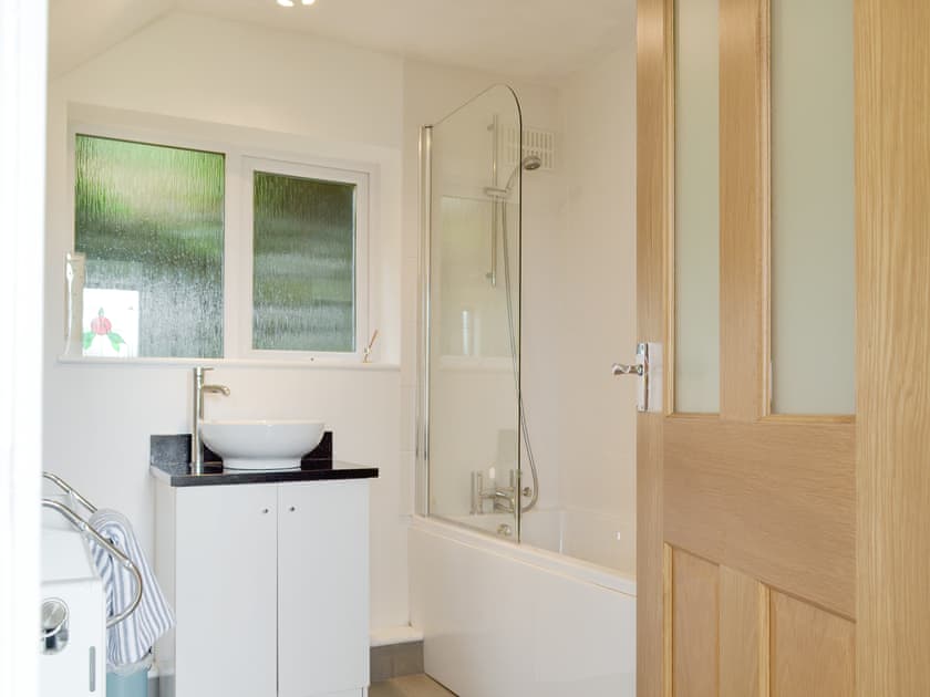 Family bathroom with shower over bath | Rock Cottage, Birchover, near Matlock