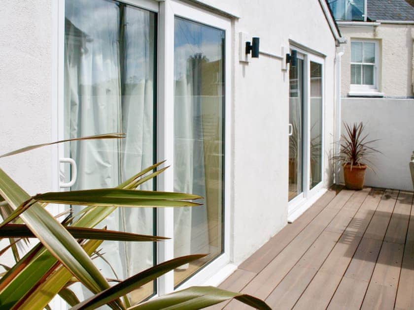 Patio doors from the double bedrooms onto the enclosed decked terrace | Lower Marcam, Salcombe