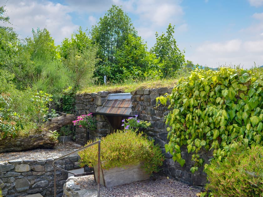 Part stone-built detached cottage, with unusual turf roof | Waterside - Mullardoch Cottages, by Inverinate, Kyle