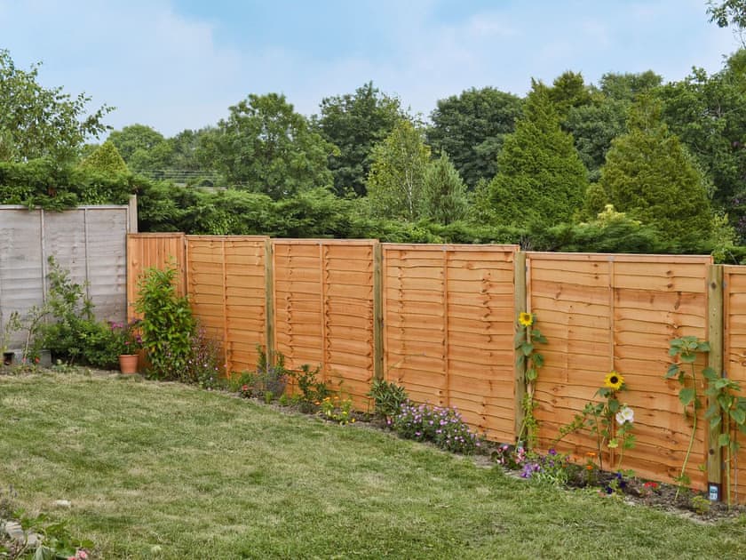 Small, enclosed garden | Stonechat Barn - Little Derril, Derril, near Bude