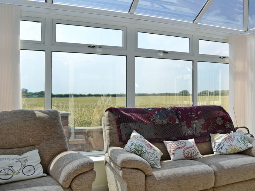 Relaxing conservatory | Authorpe Bungalow, Hogsthorpe, near Skegness