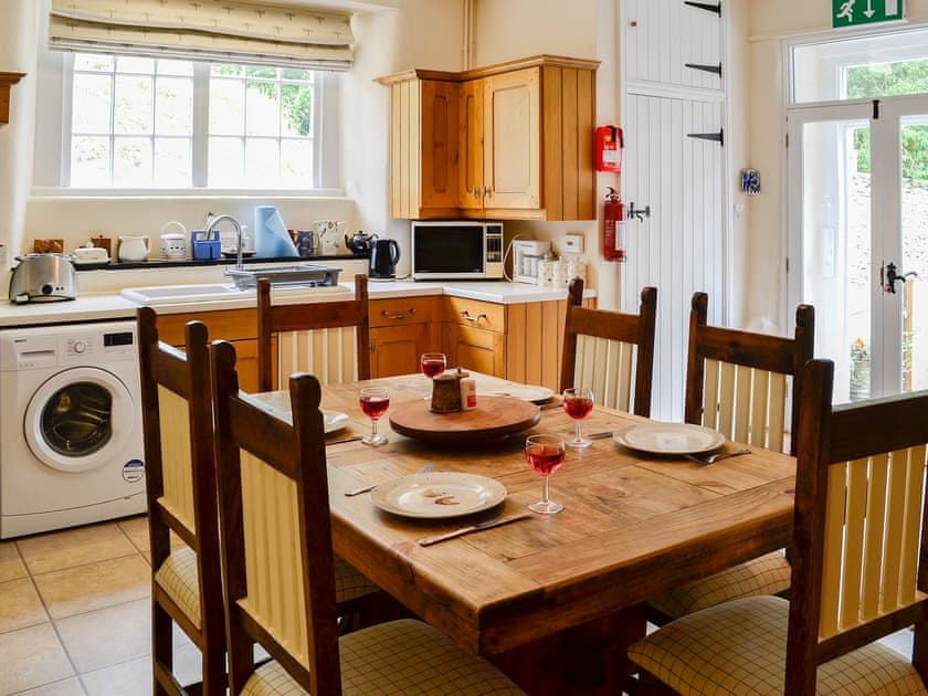 Delightful kitchen/diner with double doors to the decked area | Crogen Wing, Bala