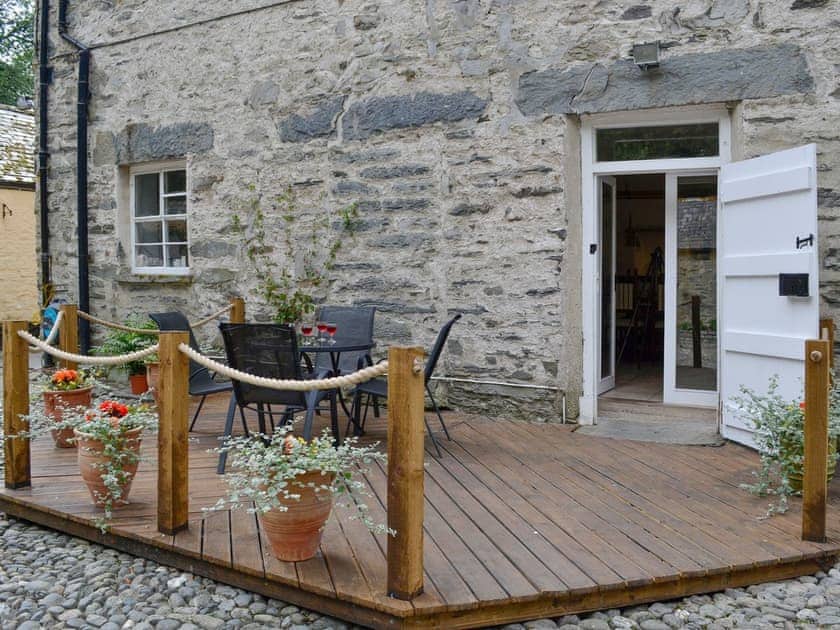 Privatte decked area just off the kitchen/diner | Crogen Wing, Bala