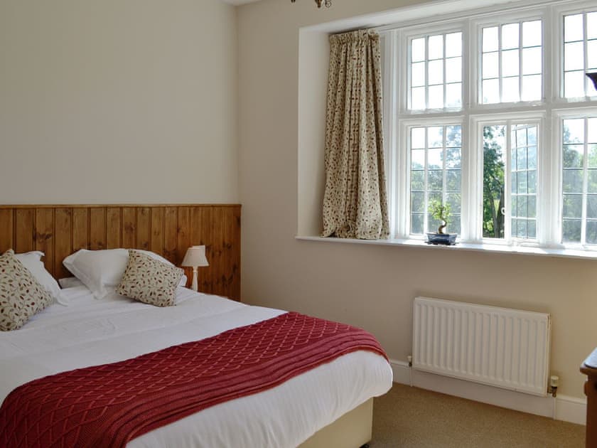 Comfortable double bedroom | The Farmhouse - Round Chimneys Farm, Glanvilles Wootton, near Sherborne