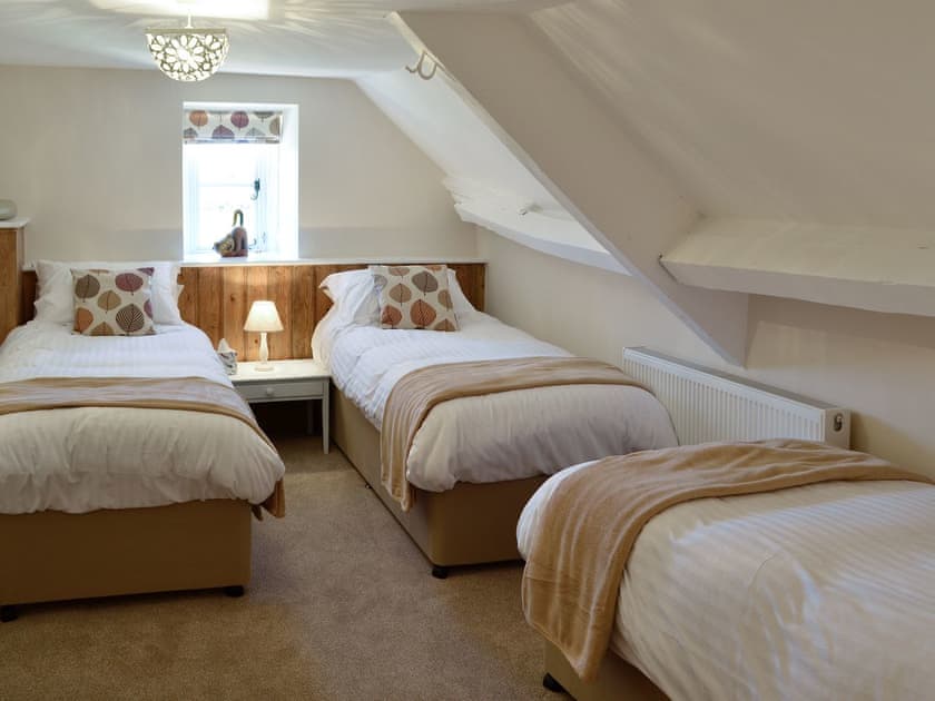 Triple bedroom with 3 single beds | The Farmhouse - Round Chimneys Farm, Glanvilles Wootton, near Sherborne