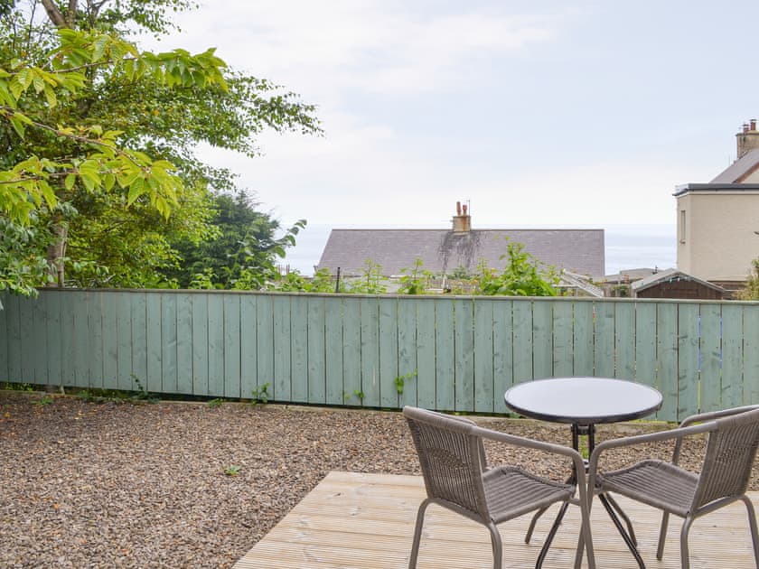 Patio area with views towards the sea | Crew House, Craster, near Alnwick