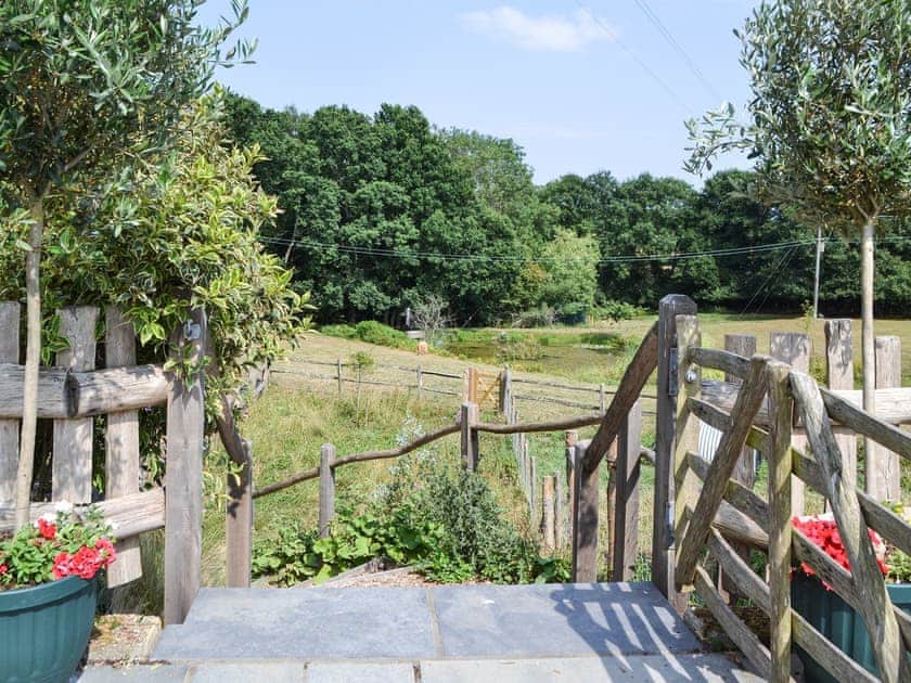 Gate to steps down to wild flower meadow   | Swallow’s Barn, Ashburnham, Battle