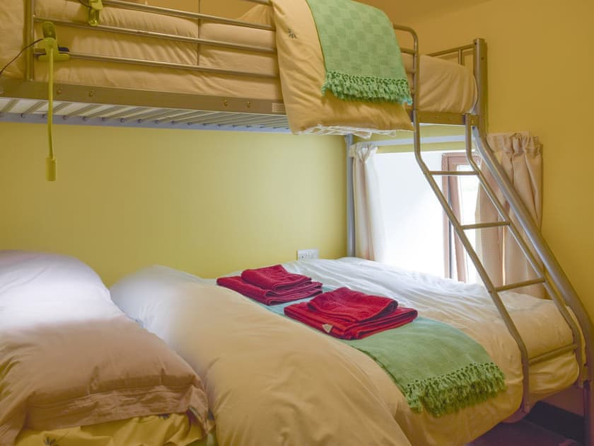 Cheerfully decorated bunk bedroom | Mill Cottage - Pendegy Mill, Llanybri, near Carmarthen