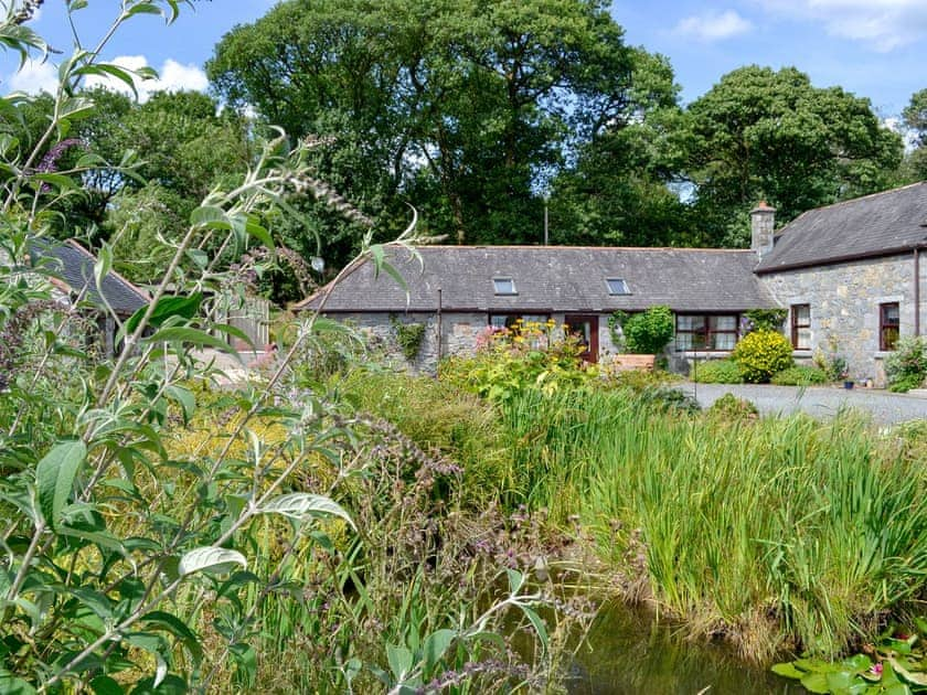 Peacefully situated in landscaped gardens in an enviable position | Low Cordorcan - Cordorcan Cottages, Wood of Cree, near Newton Stewart