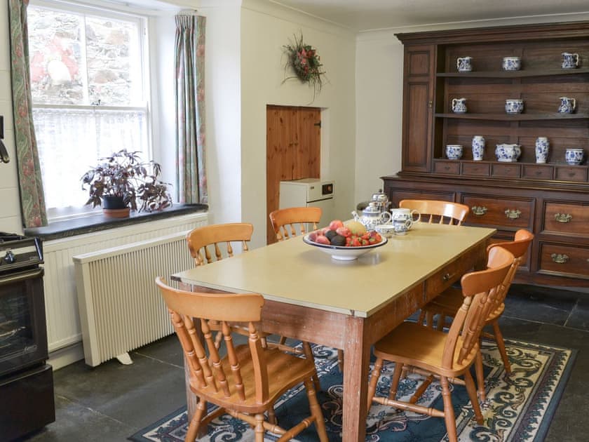 Kitchen with dining area | The Farmhouse - Lanwithan Cottages, Lostwithiel