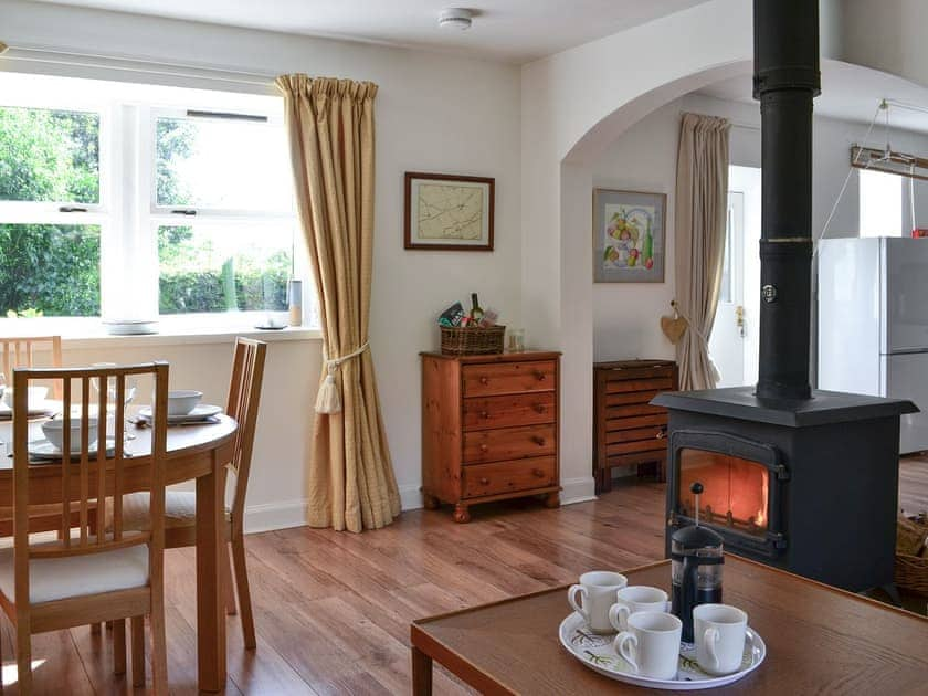 Open plan living space with wood burner | Goose Cottage, Drumcrosshall, Bathgate near Edinburgh