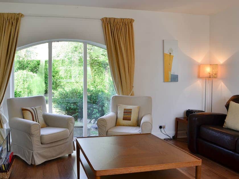 Open plan living space with wood burner | Goose Cottage, Drumcrosshall, Bathgate near Edinburgh