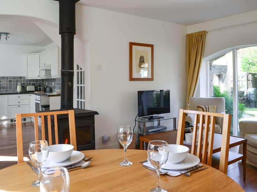 Open plan living space with wood burner | Goose Cottage, Drumcrosshall, Bathgate near Edinburgh