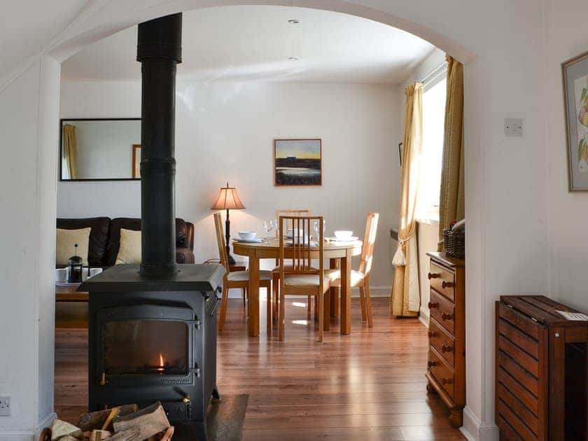 Open plan living space with wood burner | Goose Cottage, Drumcrosshall, Bathgate near Edinburgh