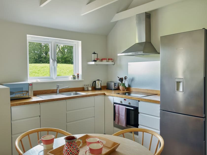 Modern fitted kitchen area | The Dairy - The Stables & The Dairy, Birdham, near Chichester