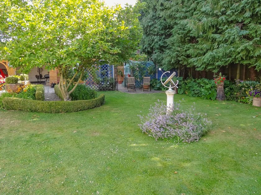 Shared lawned garden | Brook Lodge Country Cottage, Wroot, near Doncaster