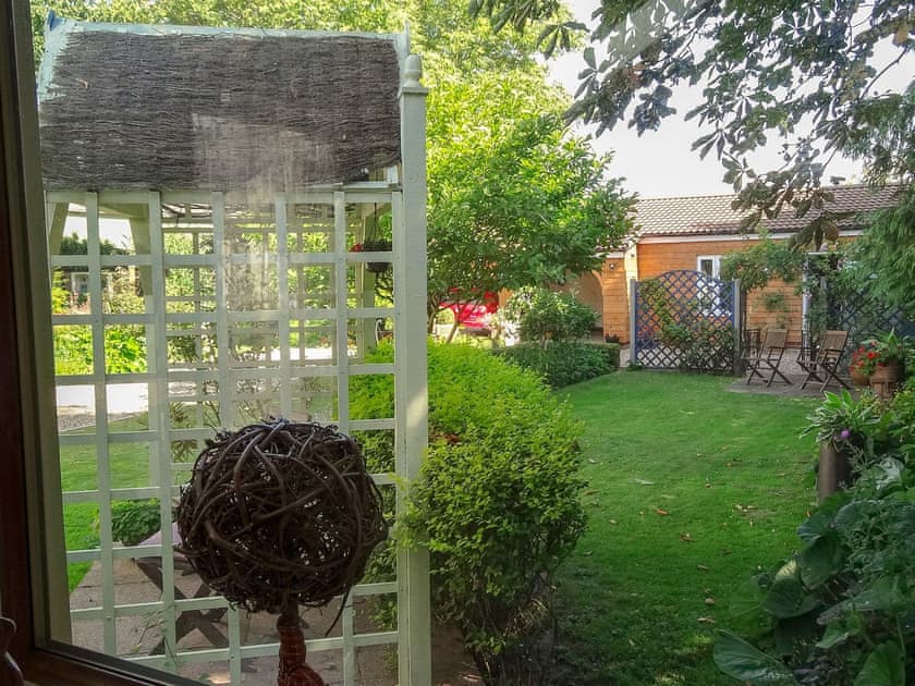 Shared lawned garden | Brook Lodge Country Cottage, Wroot, near Doncaster