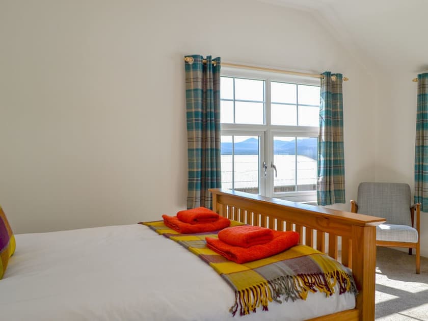 Spacious bedroom | Wester Laggan Cottage, Dulnain Bridge, near Grantown-on-Spey