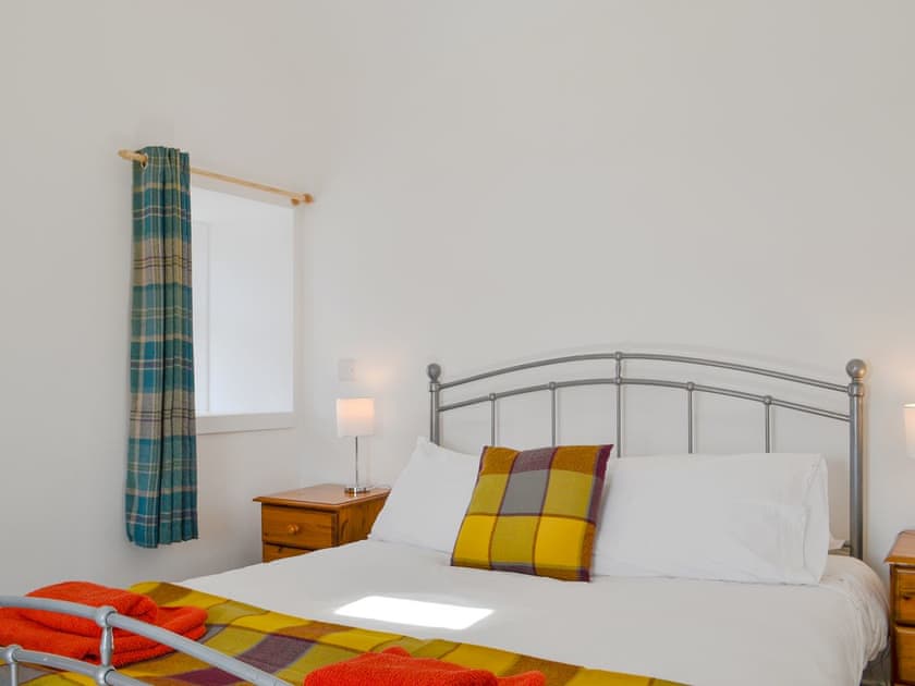 Comfortable bedroom with kingsize bed | Wester Laggan Cottage, Dulnain Bridge, near Grantown-on-Spey