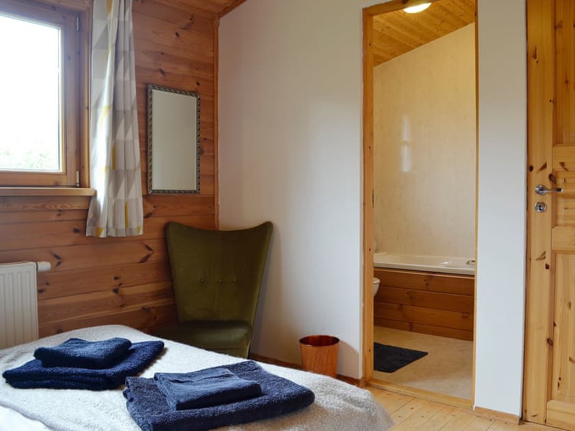 Double bedroom with en-suite bathroom | Edw Lodge - Boatside, Aberedw, near Builth Wells