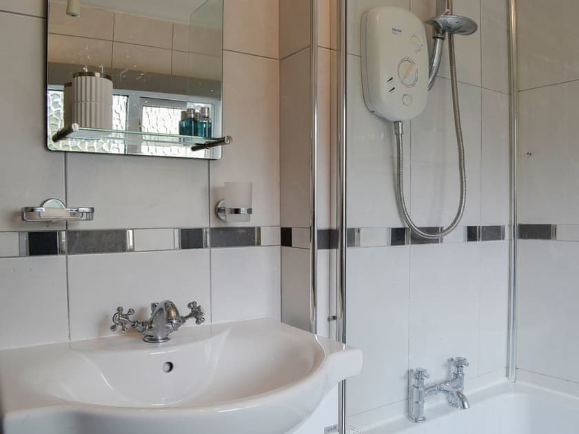 Bathroom with shower over the bath | Applegarth, Cockermouth