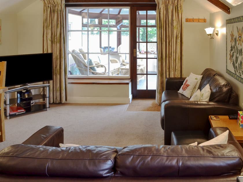 Comfortable living/ dining room | Garden Cottage, Halwell, near Totnes