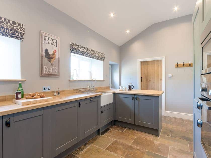 Spacious kitchen with breakfast bar | Abraham’s Cottage, Langthwaite, near Richmond